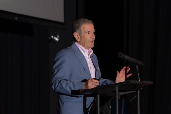 Man speaking at Attendees at Spirit of Innovation Gala 2018