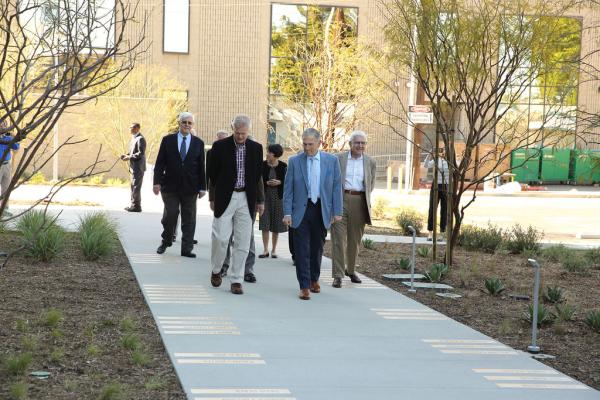 Attendees walking to Medical Research Laboratory Building Dedication
