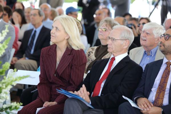 Attendees watching Medical Research Laboratory Building Dedication ceremony