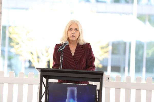 Woman speaking at Medical Research Laboratory Building Dedication